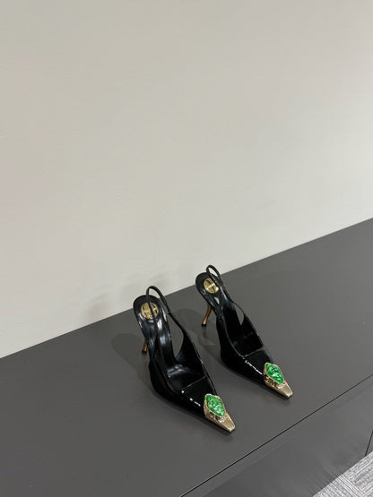 GREEN GEM-STUDDED SLINGBACK PUMPS IN BLACK PATENT CALFSKIN