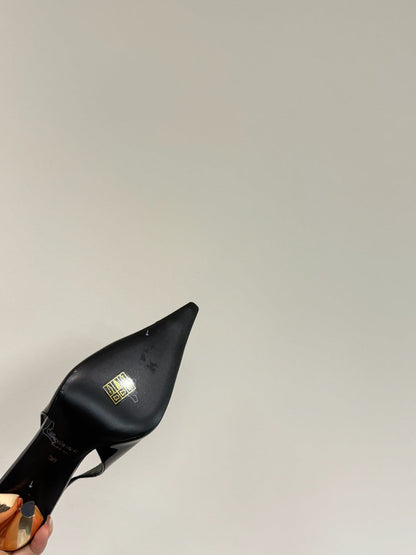 GREEN GEM-STUDDED SLINGBACK PUMPS IN BLACK PATENT CALFSKIN