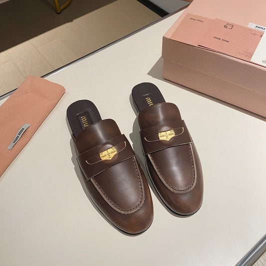 MULES SLIPPERS CHOCOLATE COLOR COWHIDE WITH GOLD COIN