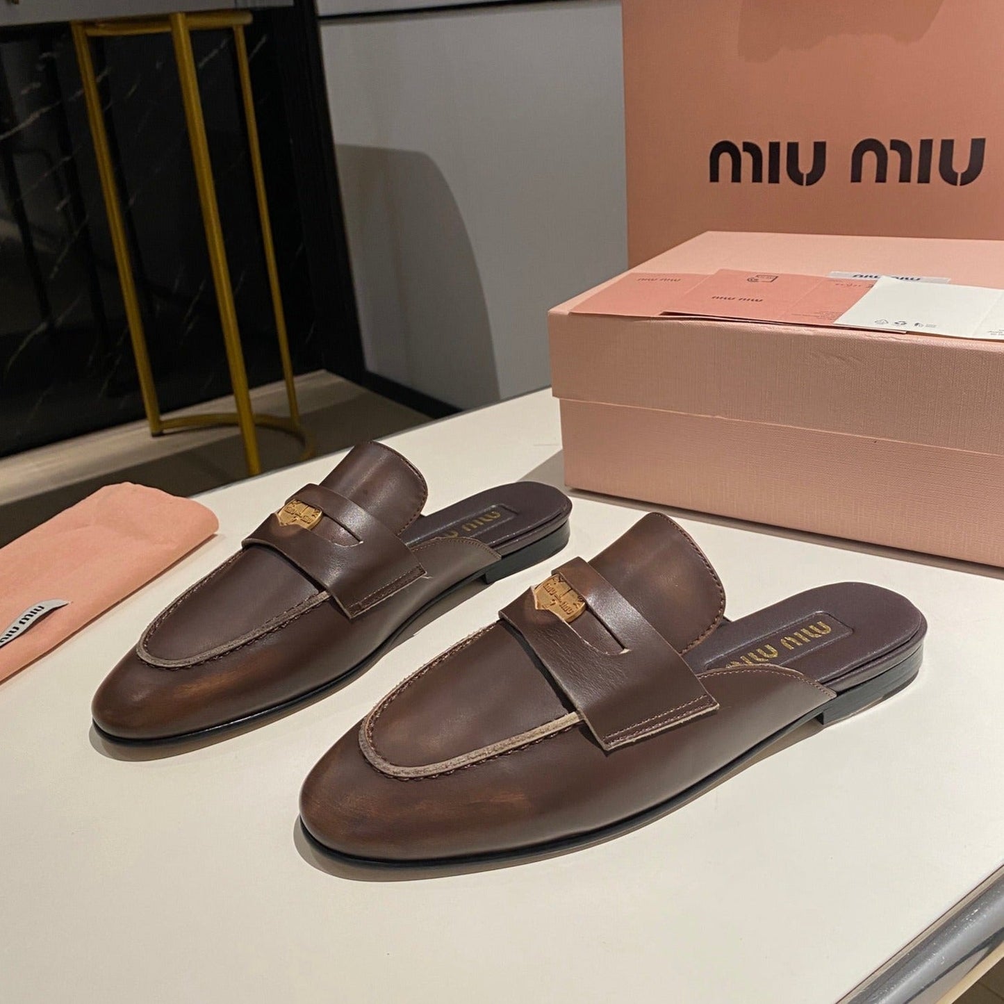 MULES SLIPPERS CHOCOLATE COLOR COWHIDE WITH GOLD COIN