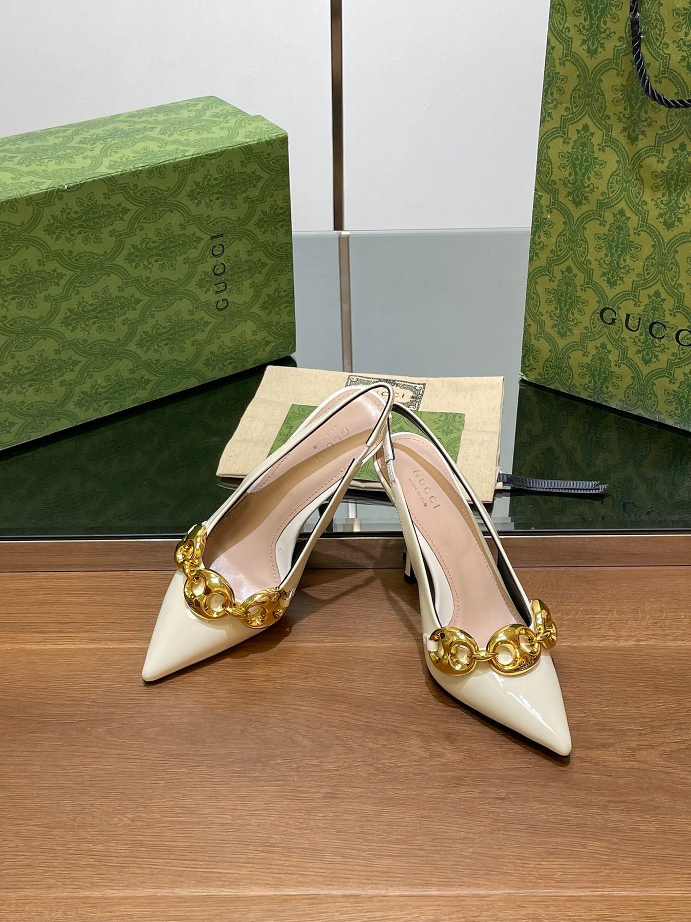 GG HIGH SLINGBACK 10.5 CM IN WHITE GLOSSY CALFSKIN WITH GOLD HARDWARE