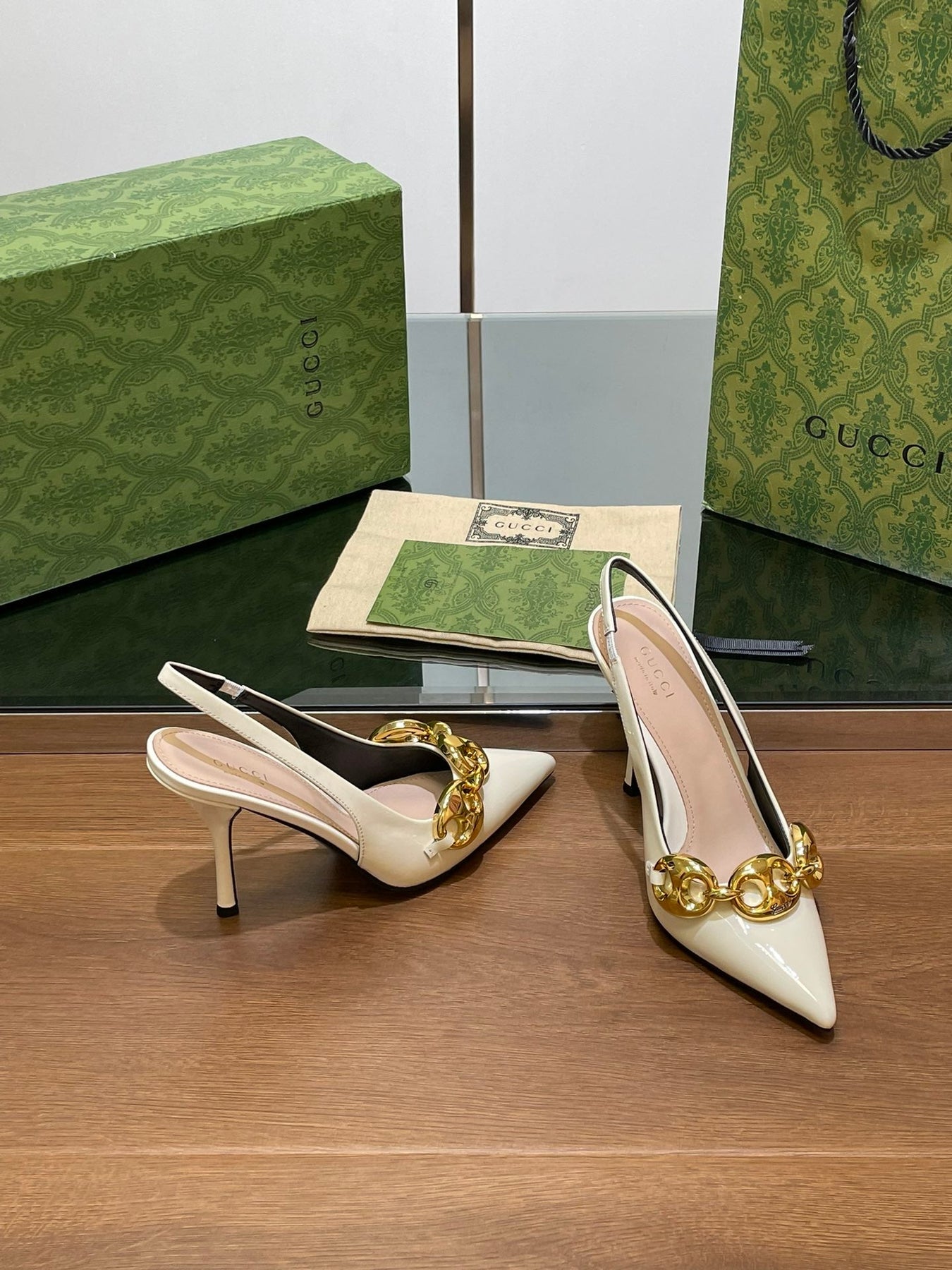 GG HIGH SLINGBACK 10.5 CM IN WHITE GLOSSY CALFSKIN WITH GOLD HARDWARE