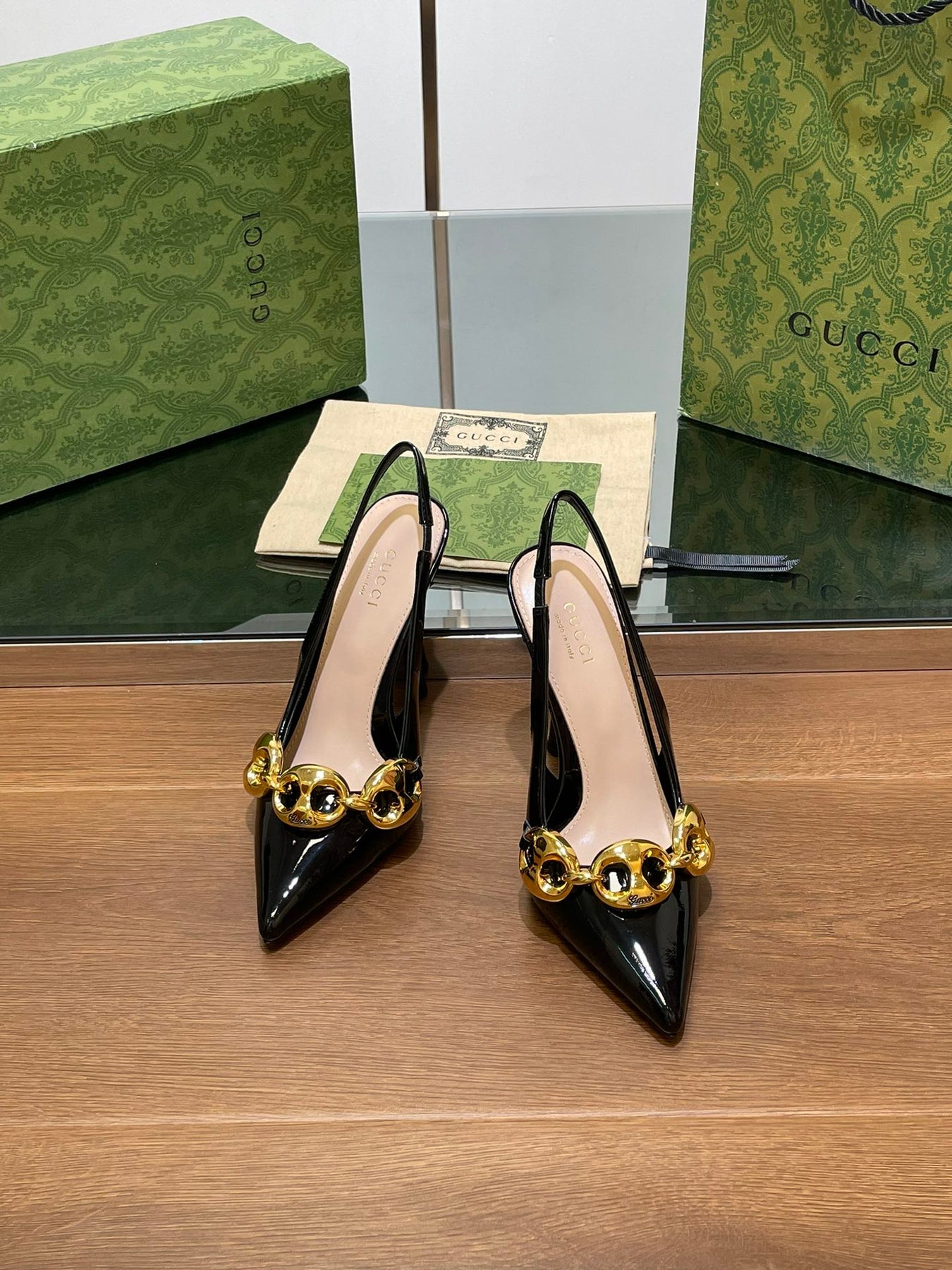 GG HIGH SLINGBACK 10.5 CM IN BLACK GLOSSY CALFSKIN WITH GOLD HARDWARE