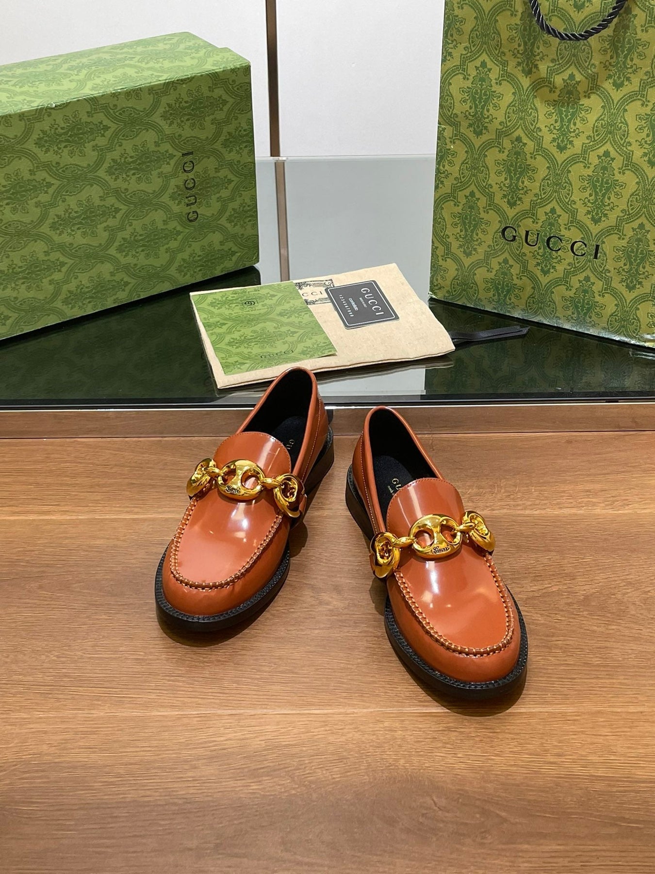 GG LOAFER SHOES IN BRONZE BROWN CALFSKIN WITH GOLD HARDWARE