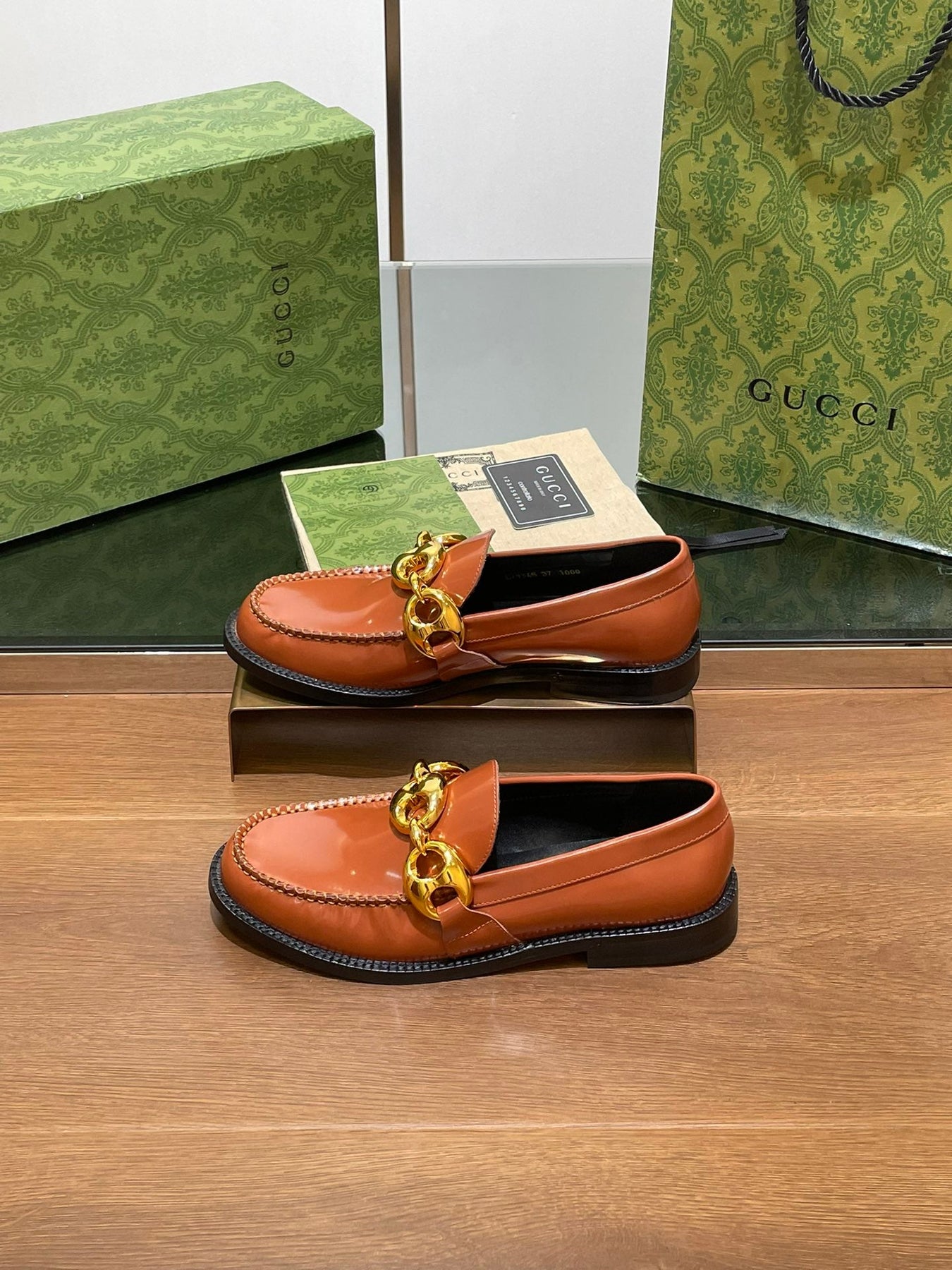 GG LOAFER SHOES IN BRONZE BROWN CALFSKIN WITH GOLD HARDWARE