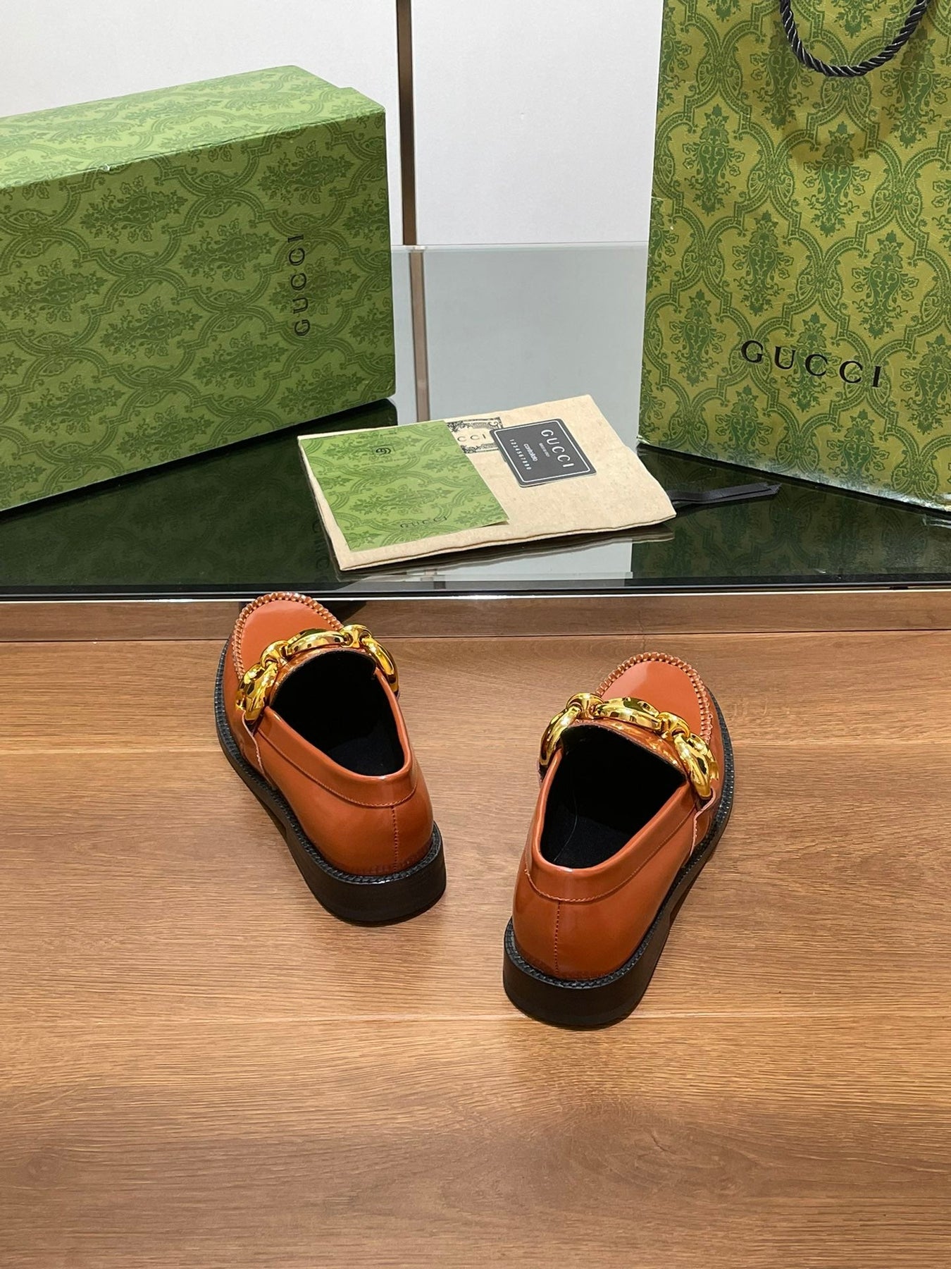 GG LOAFER SHOES IN BRONZE BROWN CALFSKIN WITH GOLD HARDWARE