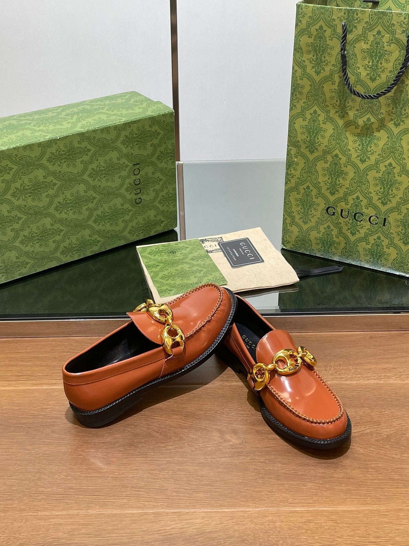 GG LOAFER SHOES IN BRONZE BROWN CALFSKIN WITH GOLD HARDWARE