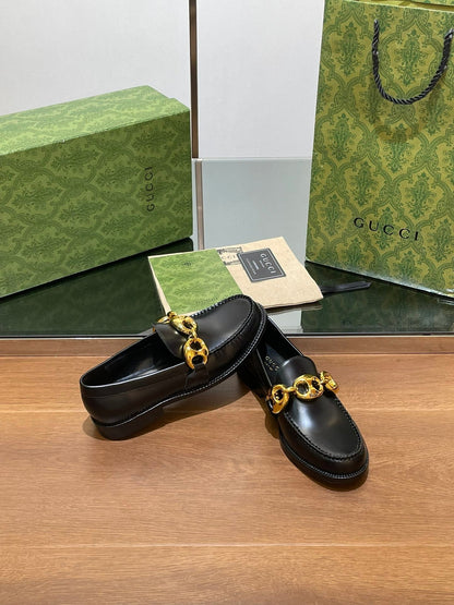 GG LOAFER SHOES IN BLACK CALFSKIN WITH GOLD HARDWARE