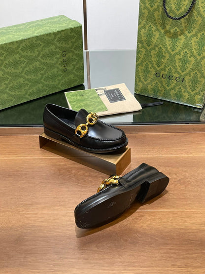 GG LOAFER SHOES IN BLACK CALFSKIN WITH GOLD HARDWARE