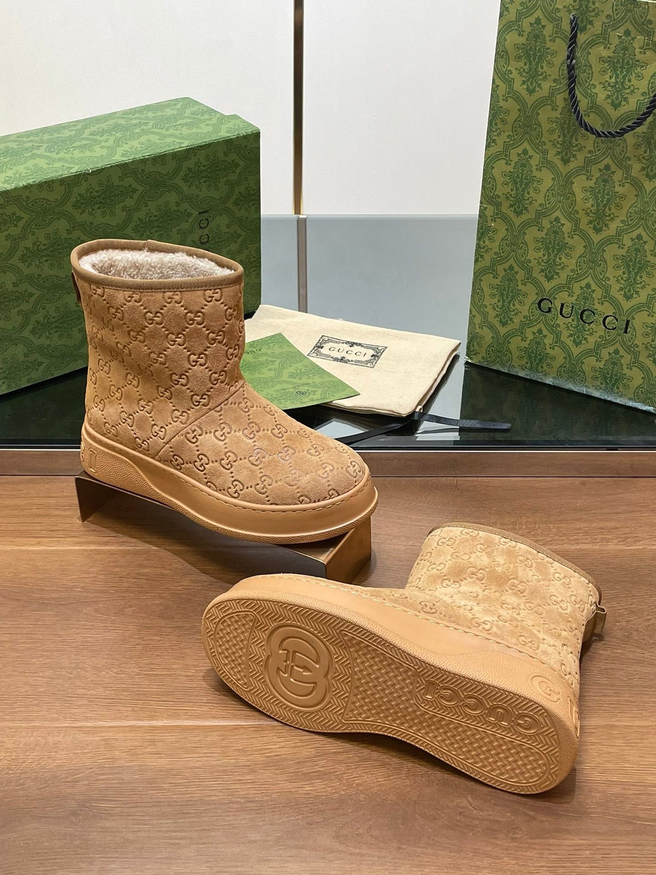 GG UGG BOOTS IN CIDER BROWN EMBOSSED SUEDE AND BEIGE WOOL LINING