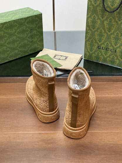GG UGG BOOTS IN CIDER BROWN EMBOSSED SUEDE AND BEIGE WOOL LINING