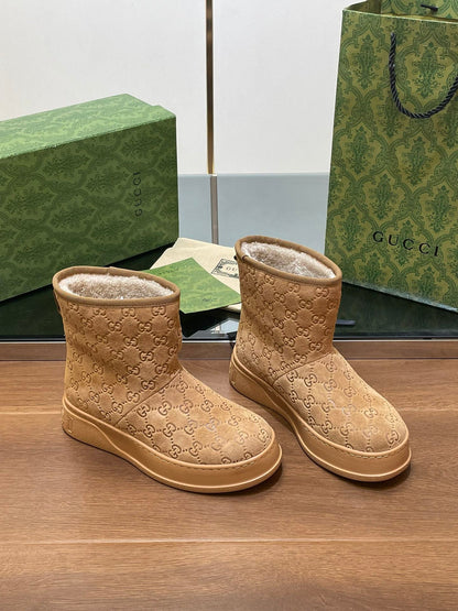 GG UGG BOOTS IN CIDER BROWN EMBOSSED SUEDE AND BEIGE WOOL LINING