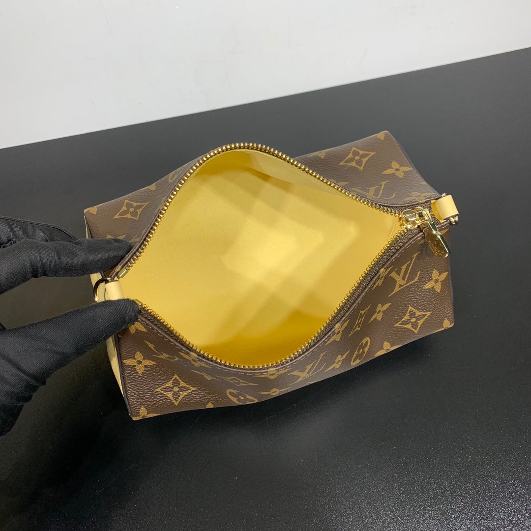 BLOOM POUCH 22 IN BROWN MONOGRAM CANVAS AND PASTEL YELLOW CALFSKIN SIDES