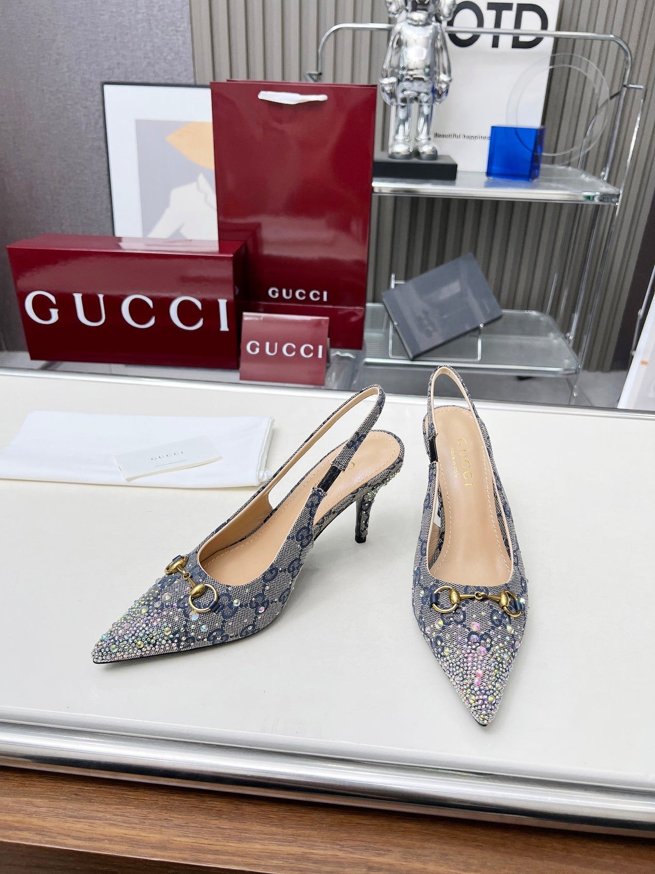 HORSEBIT SLINGBACKS IN DOVE GRAY MONOGRAM FABRIC WITH CRYSTALS