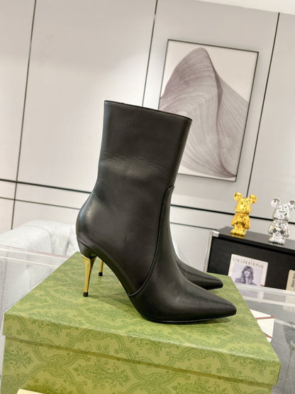 GG ANKLE BOOTS IN BLACK CALFSKIN WITH GOLD PLATED HEEL