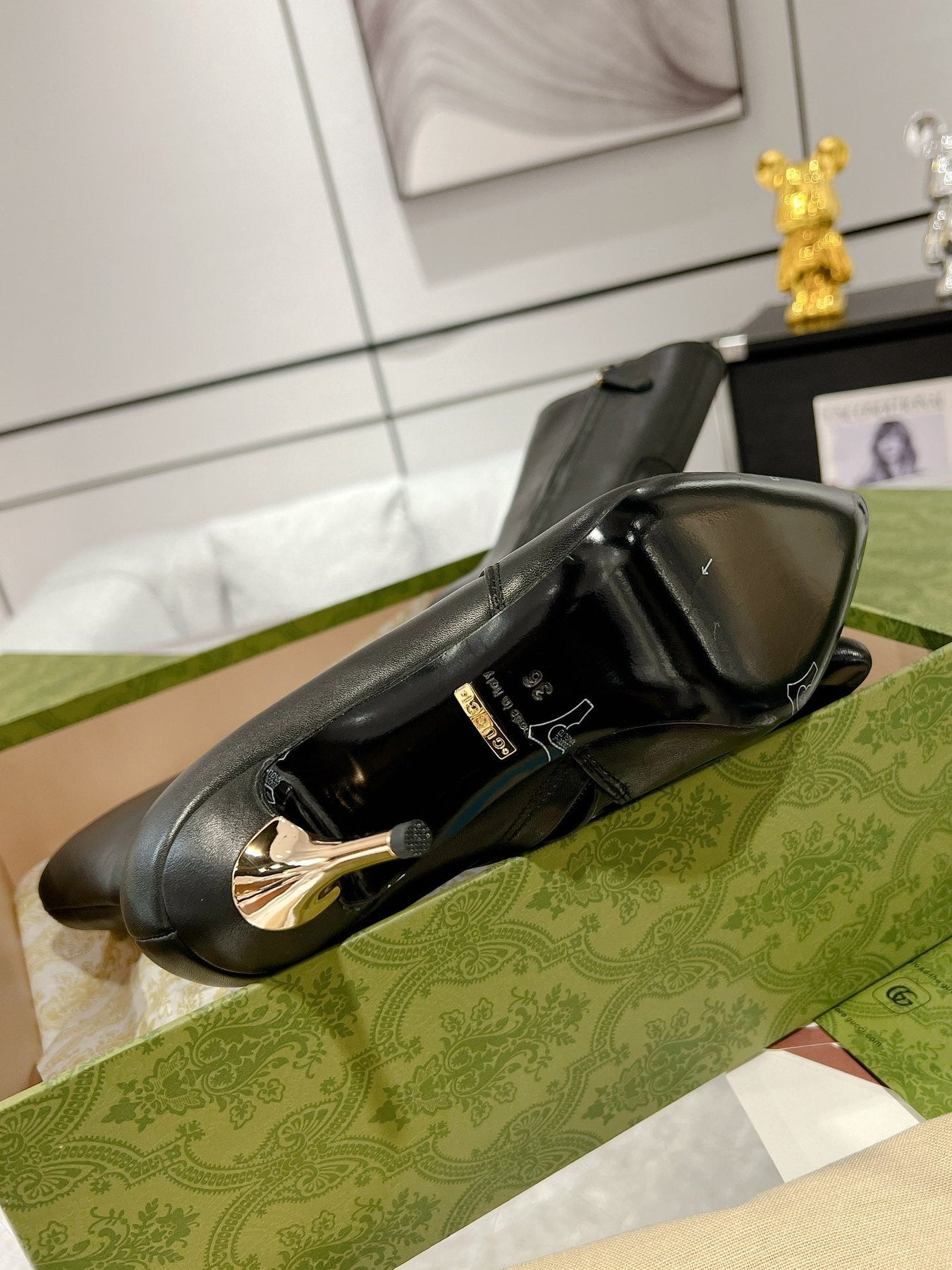 GG ANKLE BOOTS IN BLACK CALFSKIN WITH GOLD PLATED HEEL