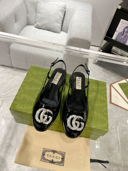 METALIC SLINGBACK FLATS IN BLACK CALFSKIN