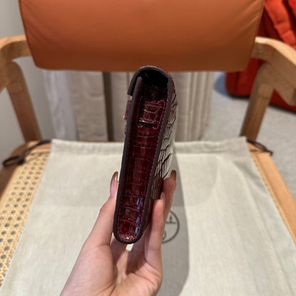 KELLY CUT 31 IN SANGRIA PURPLE ALLIGATOR LEATHER WITH GOLD HARDWARE