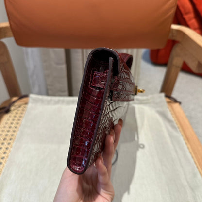 KELLY CUT 31 IN SANGRIA PURPLE ALLIGATOR LEATHER WITH GOLD HARDWARE