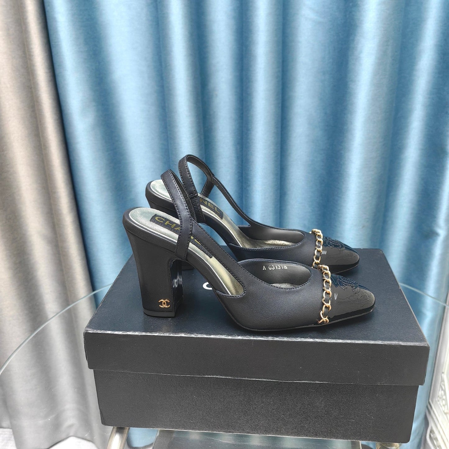HIGH SLINGBACKS IN BLACK LAMBSKIN