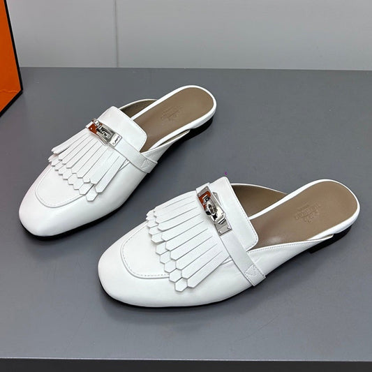 0Z MULE IN WHITE LAMBSKIN WITH FRINGE DETAIL