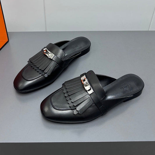 0Z MULE IN BLACK LAMBSKIN WITH FRINGE DETAIL