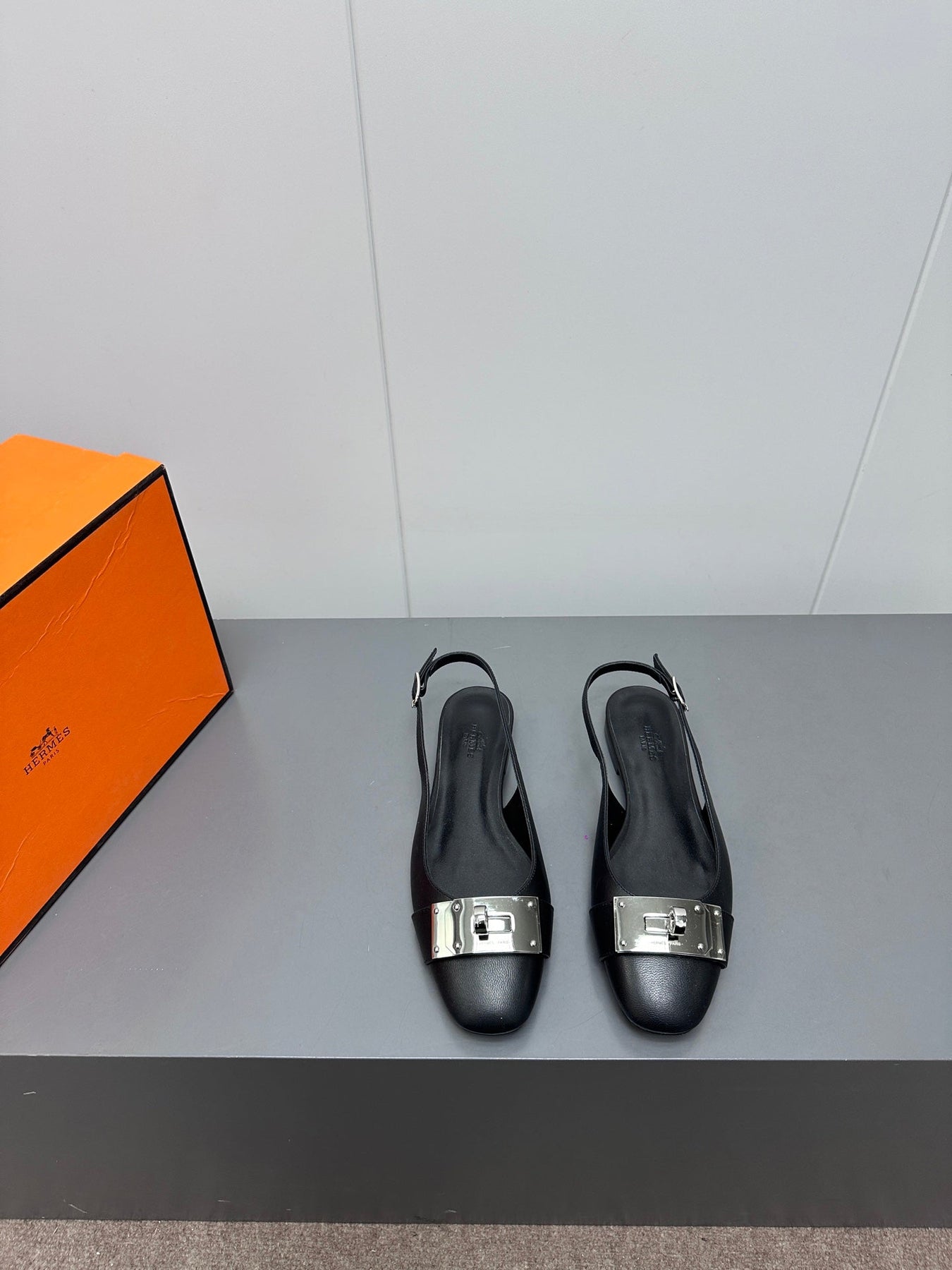 INNOCENTE SLINGBACK IN BLACK CALFSKIN