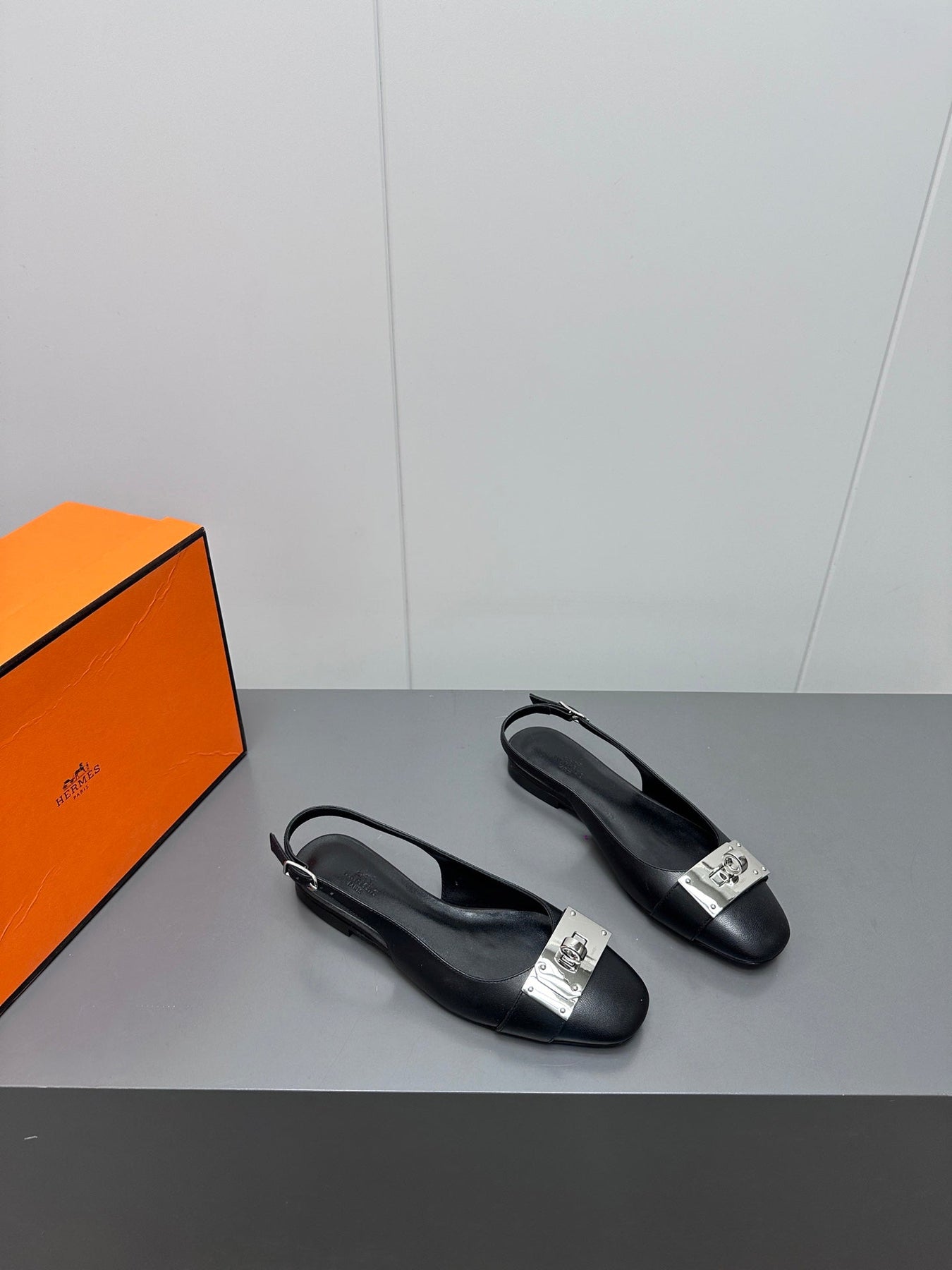 INNOCENTE SLINGBACK IN BLACK CALFSKIN