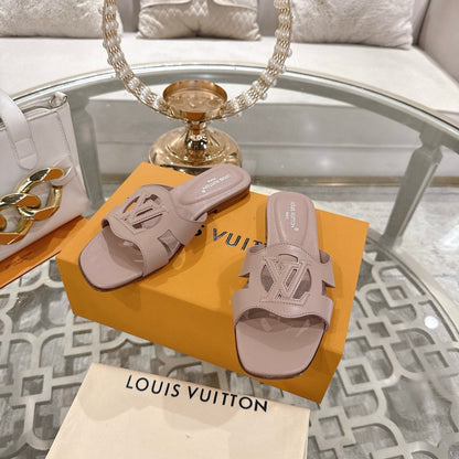 ISOLA FLAT SLIDE IN DUSTY PINK CALFSKIN