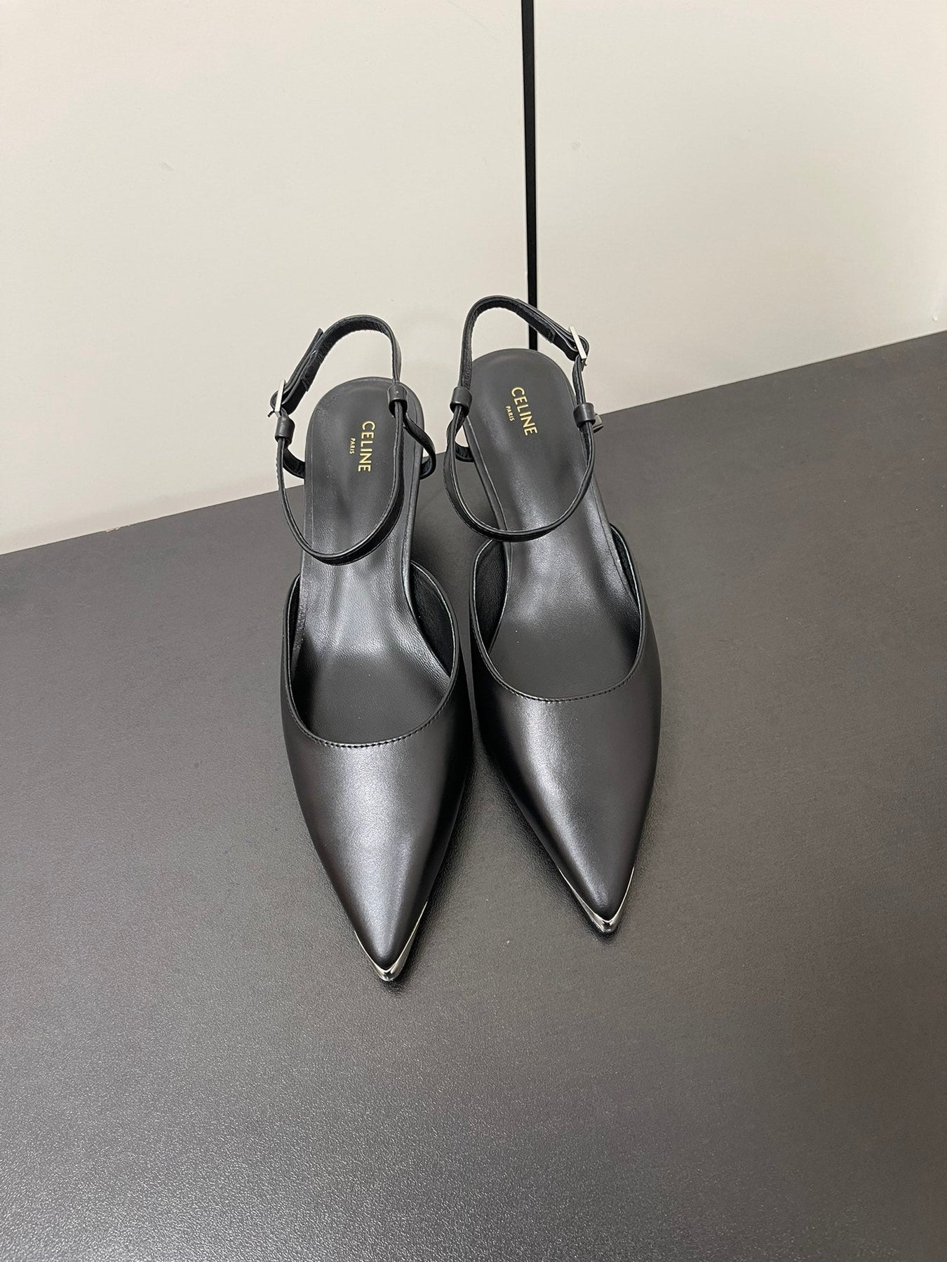 MORRAINE SLINGBACK PUMPS IN BLACK CALFSKIN