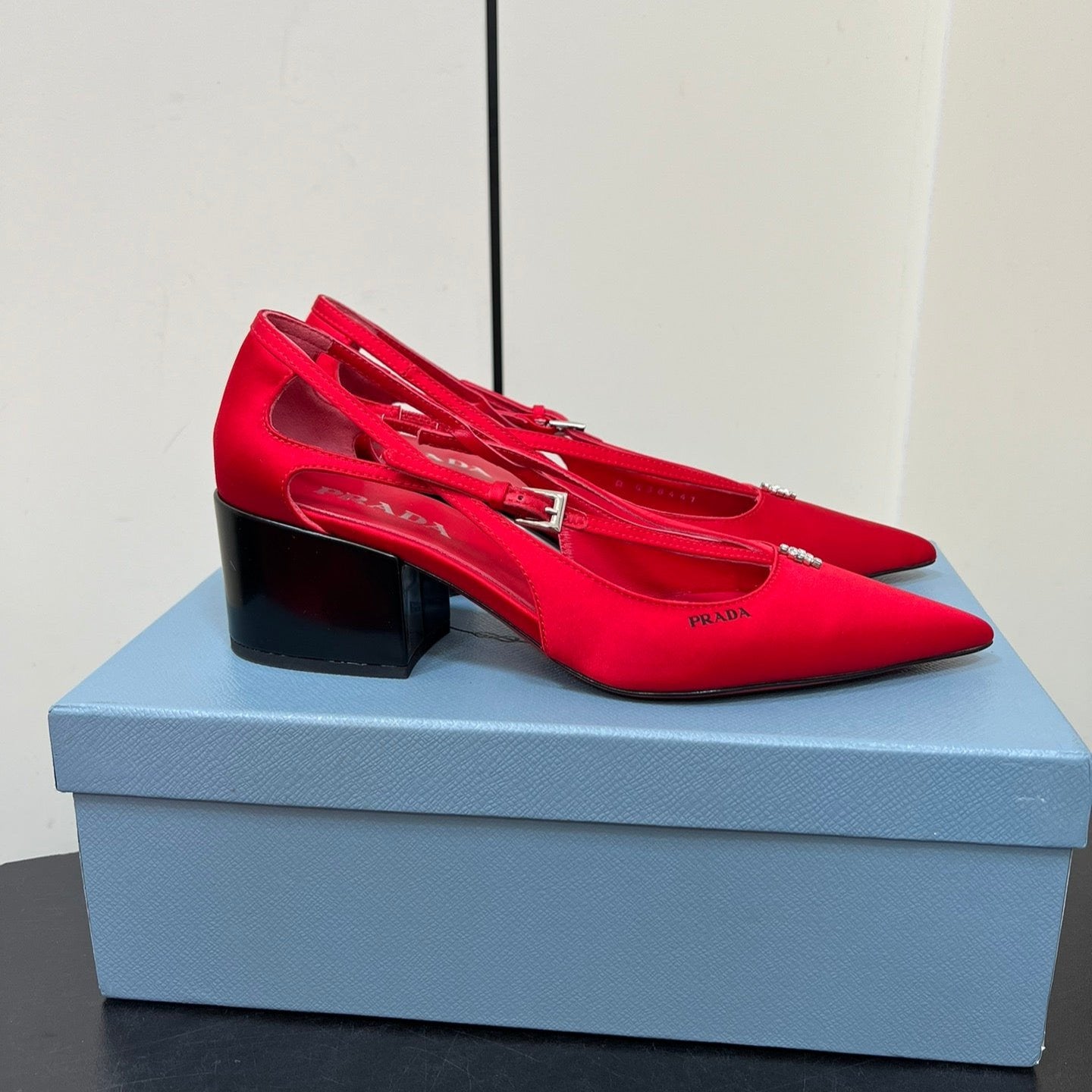 CUT-OUT PUMPS WITH BEAD BUCKLE IN CLASSIC RED SATIN