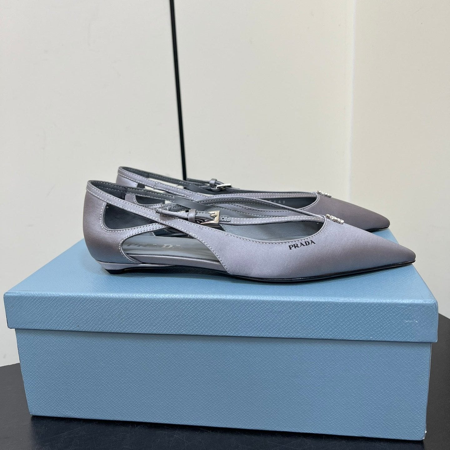 CUT-OUT BALLERINA FLAT IN WARM GRAY SATIN ATTACHED BEAD BUCKLE