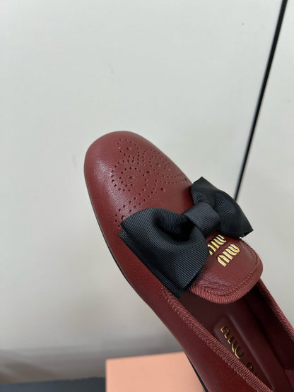 LOAFERS WITH BOW IN RED BROWN SHEEPSKIN