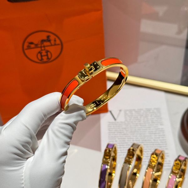 HERM Orange Mini Clic Kelly Bracelet