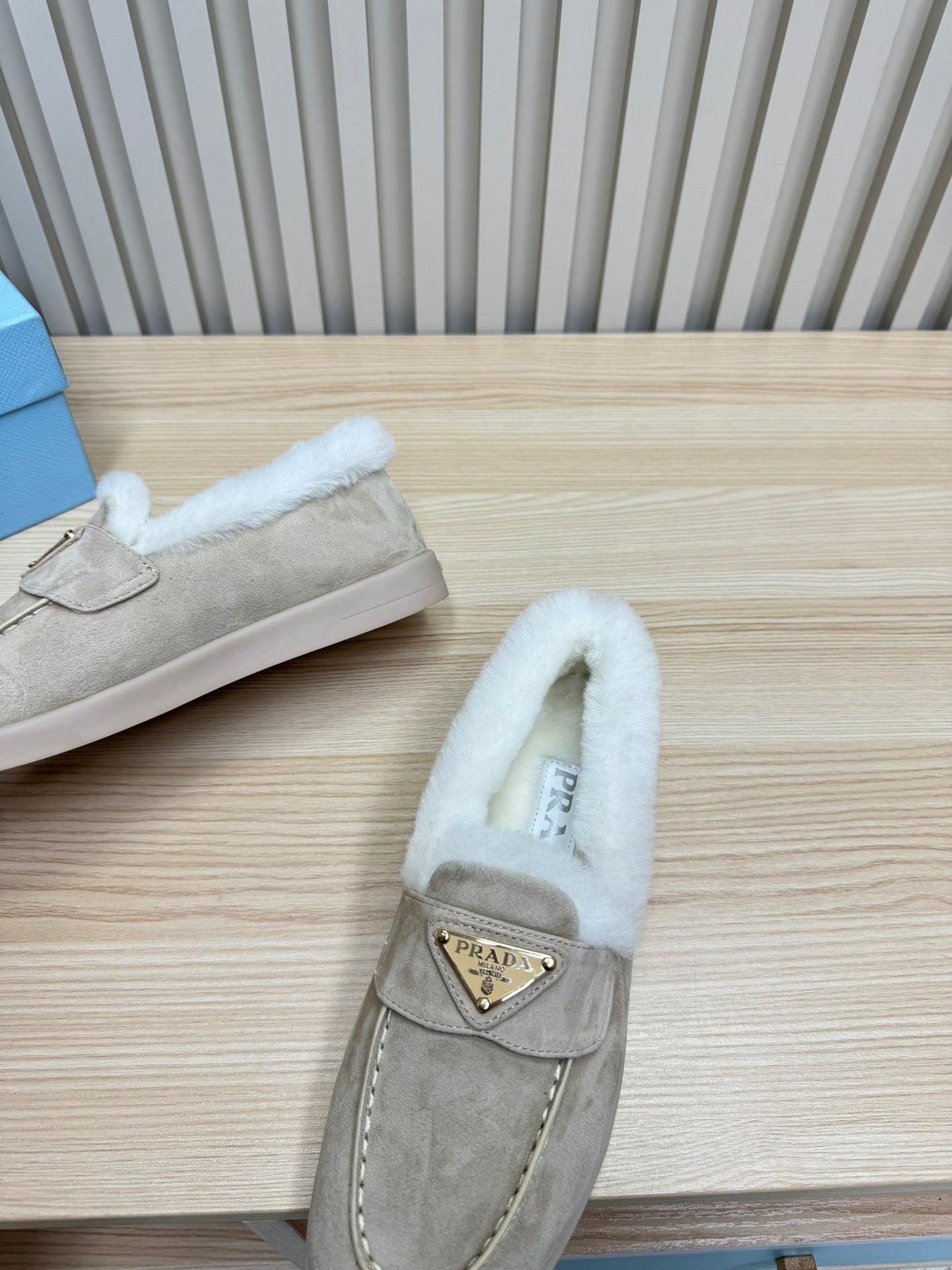 LOAFER IN KHAKI BEIGE SUEDE AND FUR LINING ATTACHED TRIANGLE LOGO