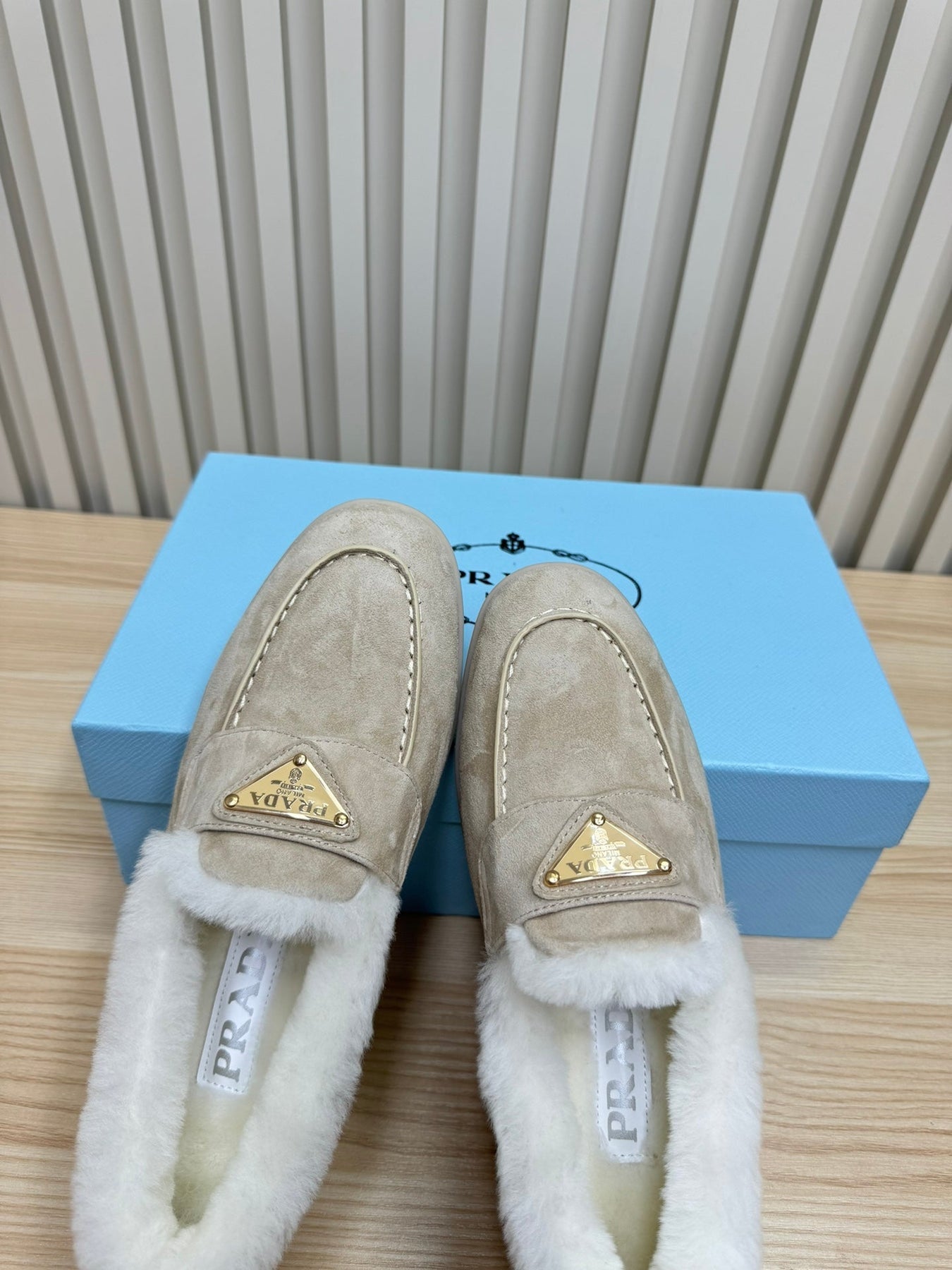 LOAFER IN KHAKI BEIGE SUEDE AND FUR LINING ATTACHED TRIANGLE LOGO