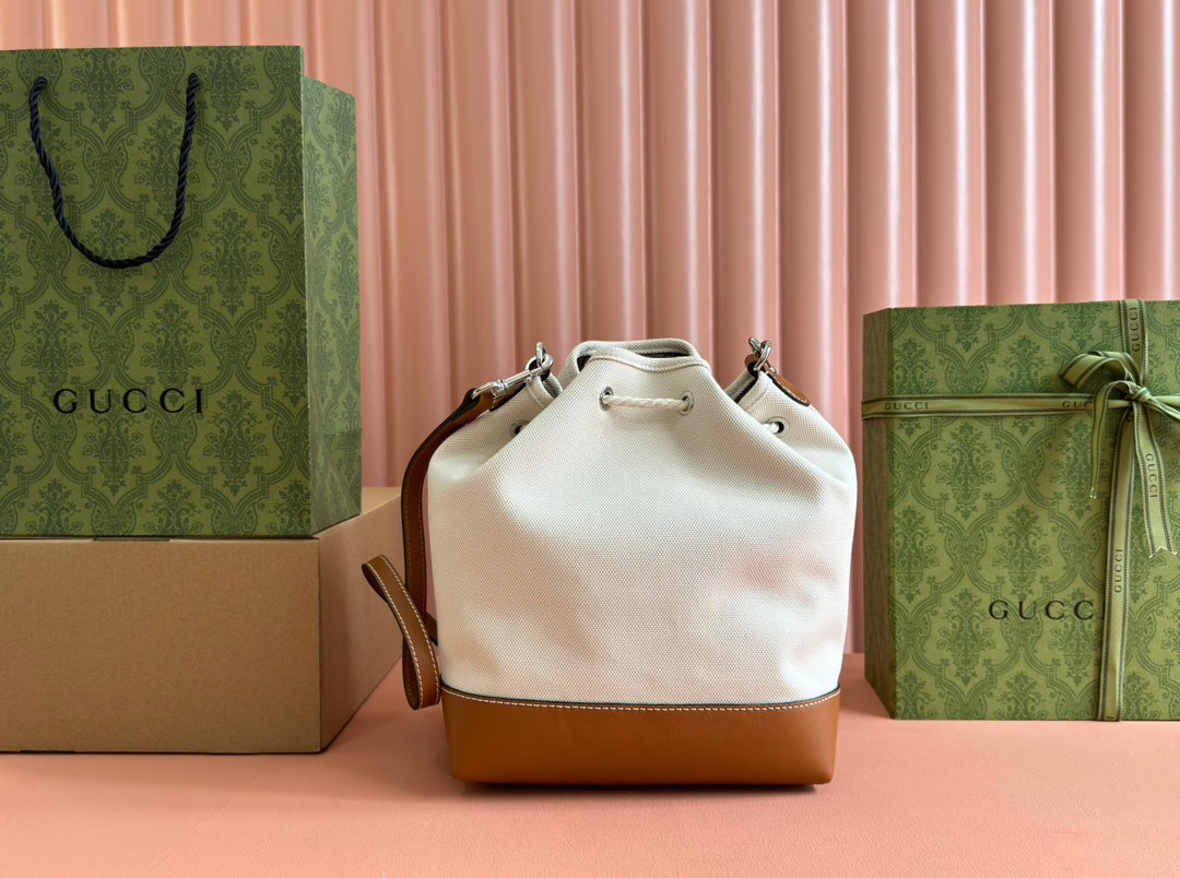 DRAWSTRING SHOULDER BAG LOGO PRINT 31 IN WHITE CANVAS BROWN CALFSKIN