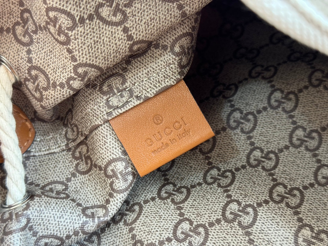 DRAWSTRING SHOULDER BAG LOGO PRINT 31 IN WHITE CANVAS BROWN CALFSKIN