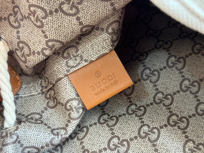 DRAWSTRING SHOULDER BAG LOGO PRINT 31 IN WHITE CANVAS BROWN CALFSKIN