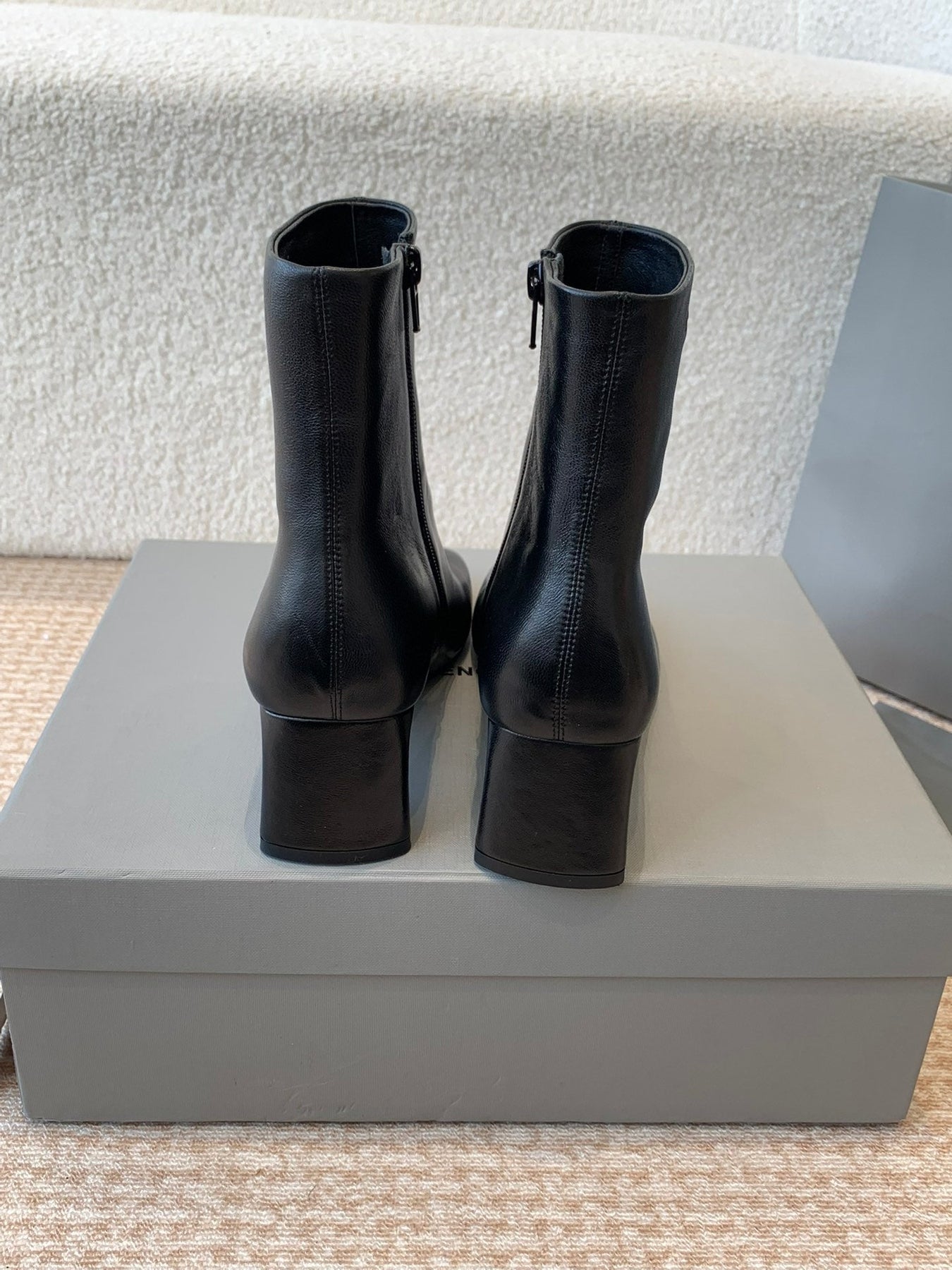 ANKLE BOOTS IN BLACK LOGO EMBOSSED SOFT SHEEPSKIN