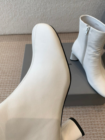 ANKLE BOOTS IN WHITE LOGO EMBOSSED SOFT SHEEPSKIN