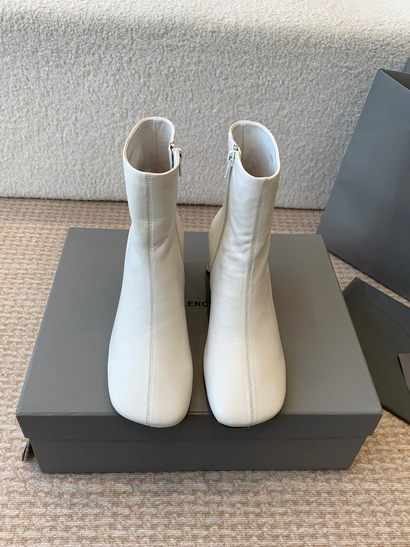 ANKLE BOOTS IN WHITE LOGO EMBOSSED SOFT SHEEPSKIN