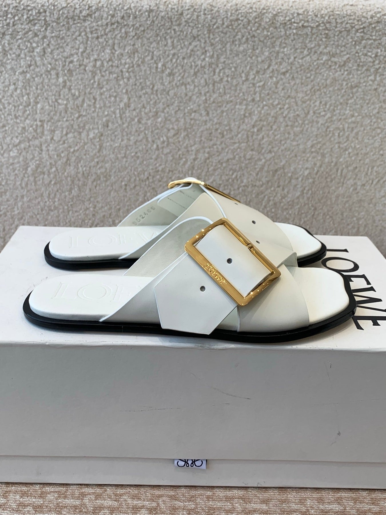 PETAL BELT FLAT SANDAL IN WHITE CALFSKIN