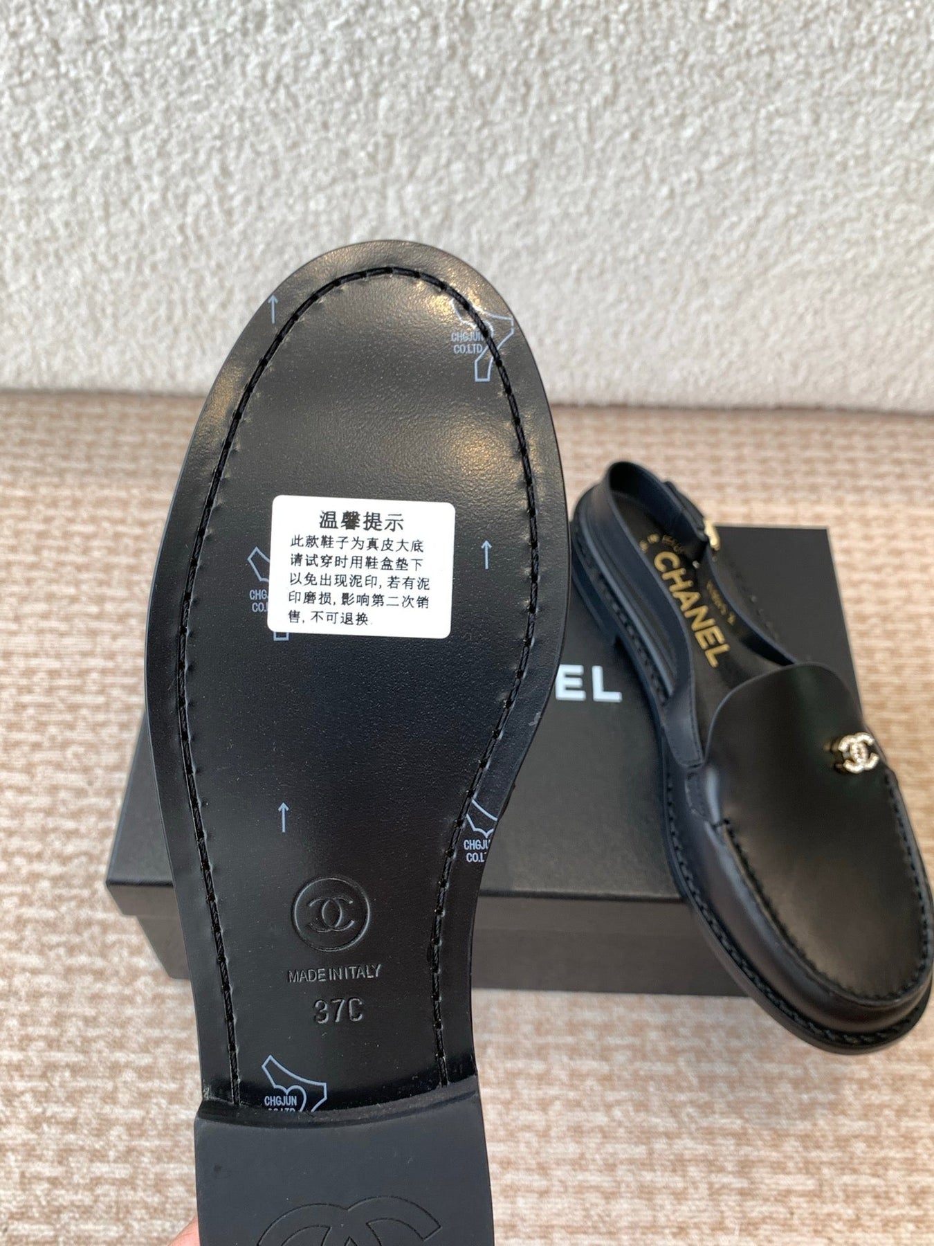 CC MOCCASIN SLINGBACK IN BLACK CALFSKIN