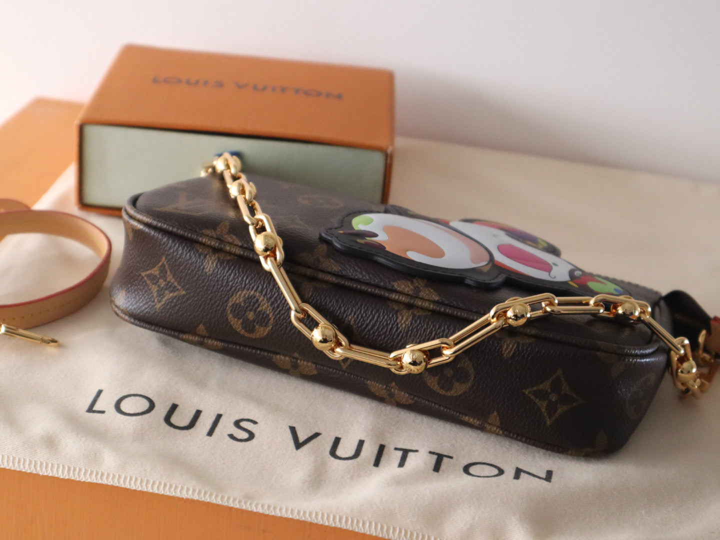 PANDA POCHETTE BAG 22 IN BROWN MONOGRAM COATED CANVAS