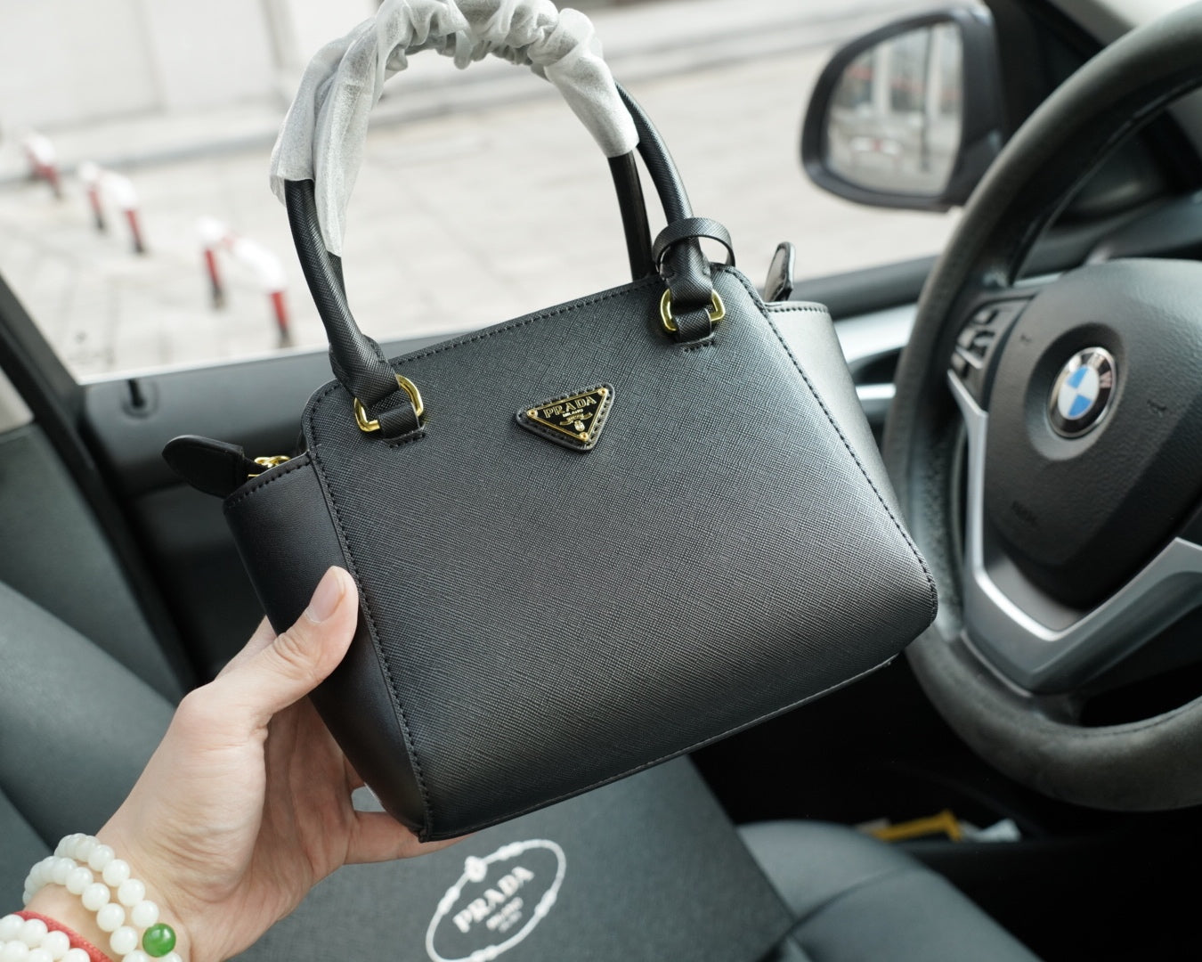 RE-EDITION TOP HANDLE BAG 20 IN BLACK CALFSKIN