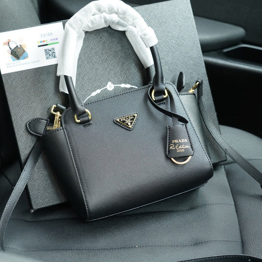 RE-EDITION TOP HANDLE BAG 20 IN BLACK CALFSKIN