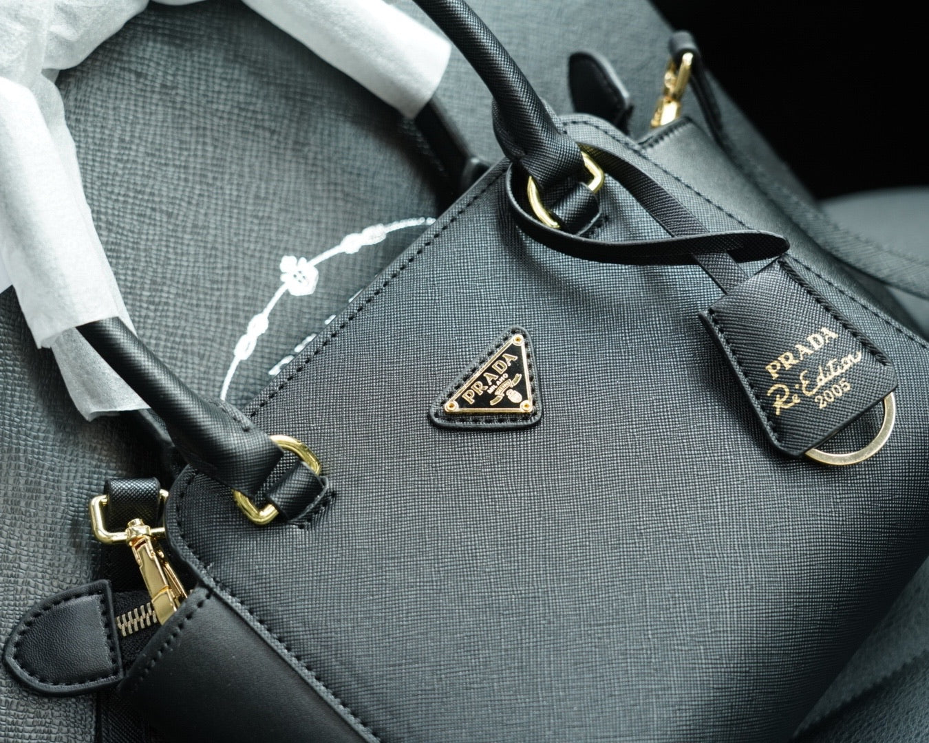 RE-EDITION TOP HANDLE BAG 20 IN BLACK CALFSKIN