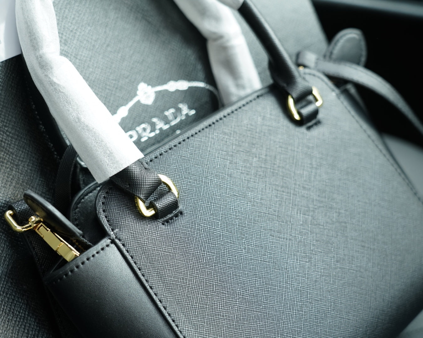 RE-EDITION TOP HANDLE BAG 20 IN BLACK CALFSKIN