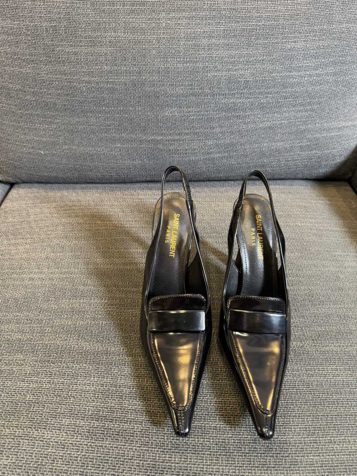 POINTED-TOE SLINGBACK PUMPS IN BLACK SHINY CALFSKIN